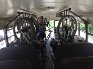 Shuttle bus loaded with bikes for return trip